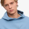 Übergroßer Kapuzenpullover aus Bio-Baumwolle – Seaside Blue