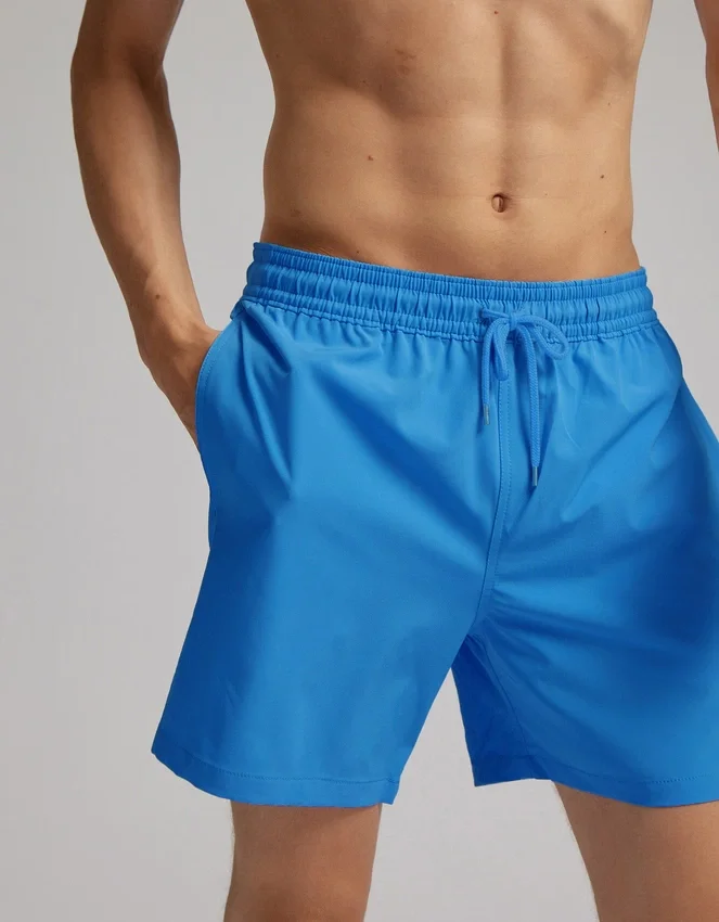 Klassische Badeshorts – Leuchtendes Korallenrot