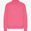 Rollkragenpullover aus Merinowolle – Bubblegum-Pink