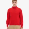 Rollkragenpullover aus Merinowolle – Mandarinenrot