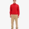 Rollkragenpullover aus Merinowolle – Mandarinenrot