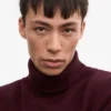 Rollkragenpullover aus Merinowolle – Oxblood-Rot