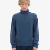 Rollkragenpullover aus Merinowolle – Petrolblau