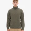 Rollkragenpullover aus Merinowolle – Staubiges Oliv