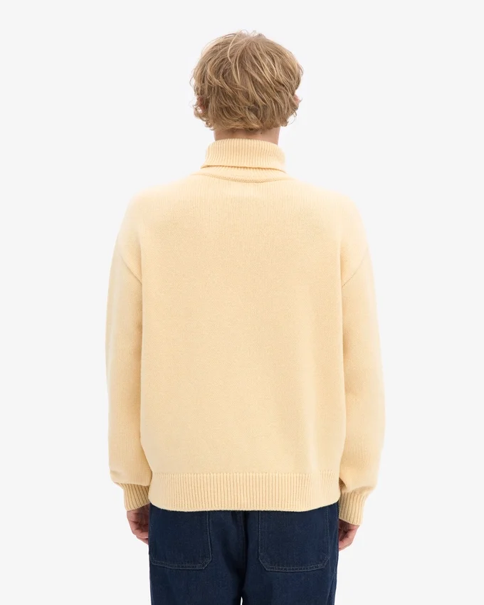Rollkragenpullover aus Merinowolle – Zartgelb